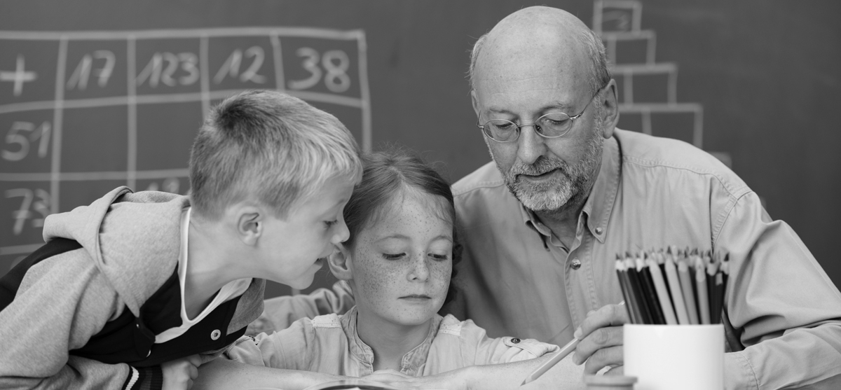 Teacher Assisting Students